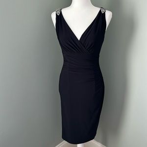 Ralph Lauren Evening Black mini dress with embellishment at shoulder. EUC